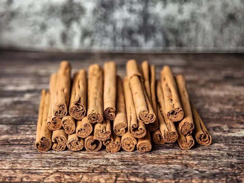 closeup-of-ceylon-cinnamon-sticks-on-wooden-table-2025-03-18-16-17-54-utc closeup-of-ceylon-cinnamon-sticks-on-wooden-table-2025-03-18-16-17-54-utc